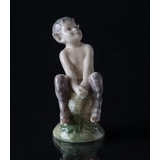 Faun (satyr, Pan) on stump, Royal Copenhagen figurine No. 1738