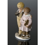 The Flight to America, Boy & Girl, Royal Copenhagen figurine no. 1761 - overglaze