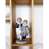 The Flight to America, two boys going to the Land of the Free, Royal Copenhagen figurine No. 1761