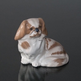 Pekinese dog sitting down, Royal Copenhagen dog figurine No. 1772