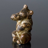 Sitting bear licking its paw, Royal Copenhagen stoneware figurine No. 21675