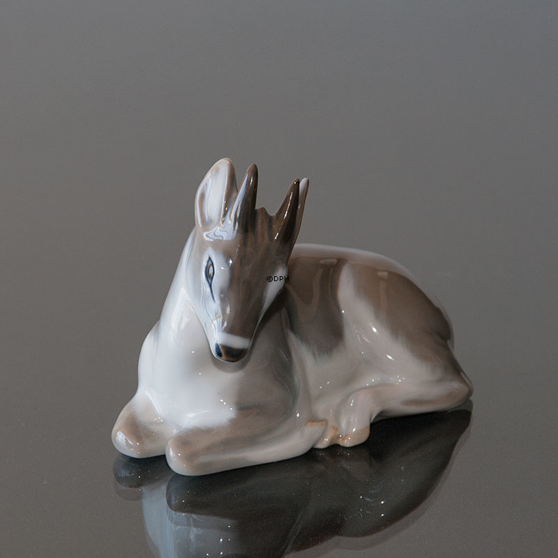 Kid, Liggende med hoved ned, Royal Copenhagen figur nr. 2648