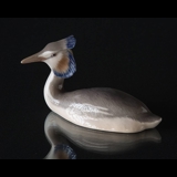 Grebe lying as if in the water, Royal Copenhagen bird figurine no. 3263