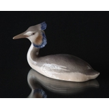 Grebe lying as if in the water, Royal Copenhagen bird figurine no. 3263