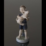 Boy with piglet, August, Royal Copenhagen monthly figurine no. 4530