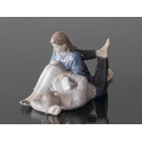 Teenagers reading closely together, Royal Copenhagen figurine No. 4649