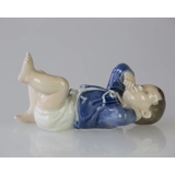 Baby som ligger på ryggen, Royal Copenhagen figur nr. 4669