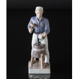 Plumber with the tools of the trade, Royal Copenhagen figurine No. 4727