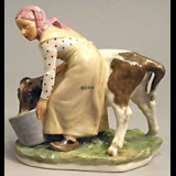 Girl with Calf, overglaze figurine Royal Copenhagen No. 779