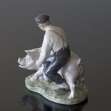 Swineherd leading the pig, Boy with pig, Royal Copenhagen figurine No. 848