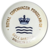 Royal Copenhagen Forhandler platte, "Royal Copenhagen Porcelain Co. Brooklyn N.Y." -  Repareret