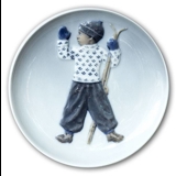 January, Royal Copenhagen plate of the month no. 3692 - Boy with skis