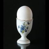 Egg cup, white with blue flower and coat of arms from East Gotland