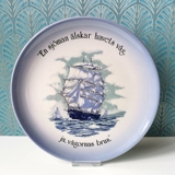 Song plate Text: "A sailor loves the wave of the sea, yes, the roar of the waves."