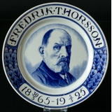Plate with "Fredrik Thorsson 1865-1925"