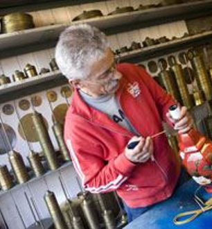 The lamp-assembling workshop was established to re-make old vases and jars into lamps