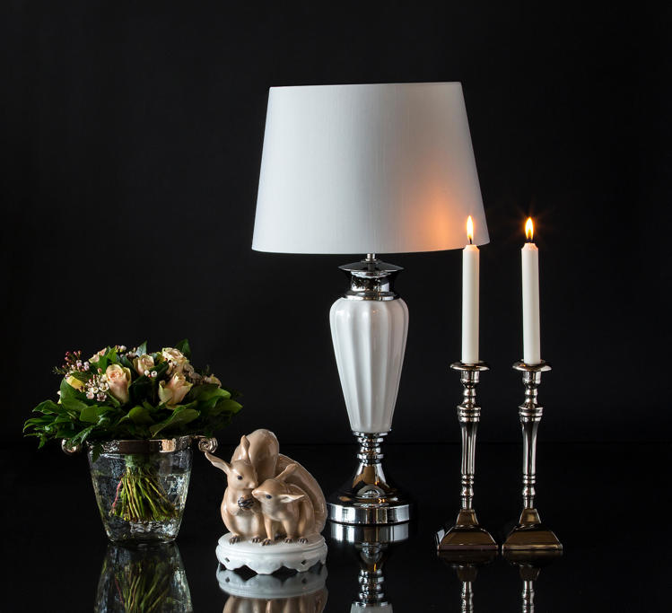 Figurine of squirrels with classic lamp and candlesticks