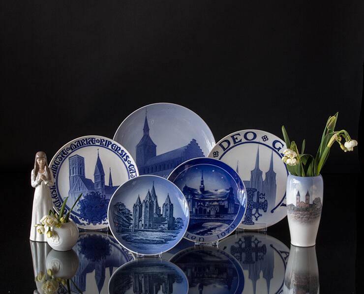 Church plate with Lucia figurine and vase with church