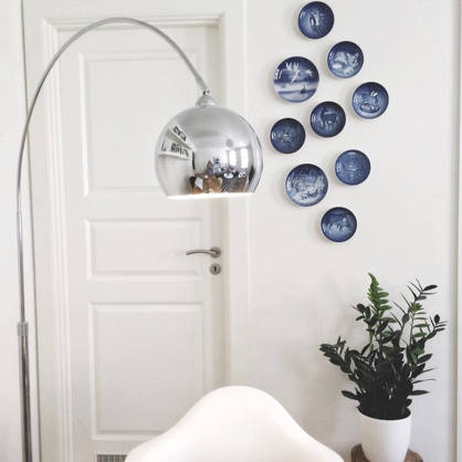 Wall decoration with plates by a door