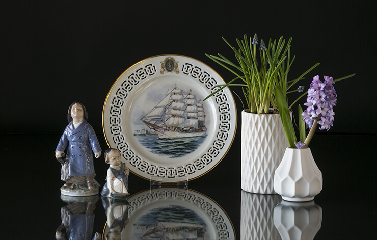 Royal Copenhagen Boy with sailing boat by Aage Erhardt