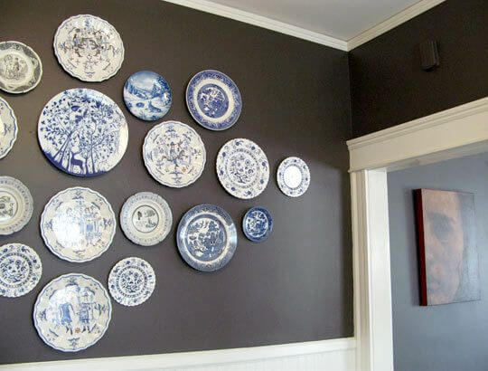 Plates hung on a dark background
