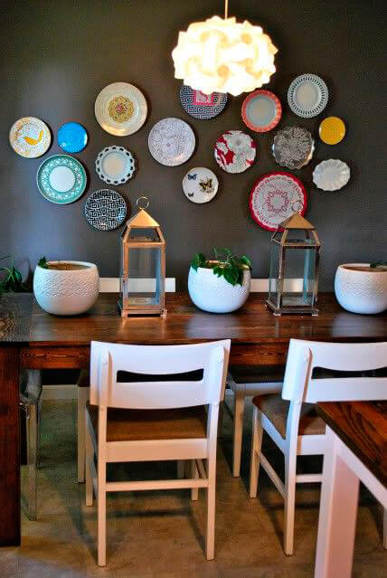 Colourful plates on a dark wall