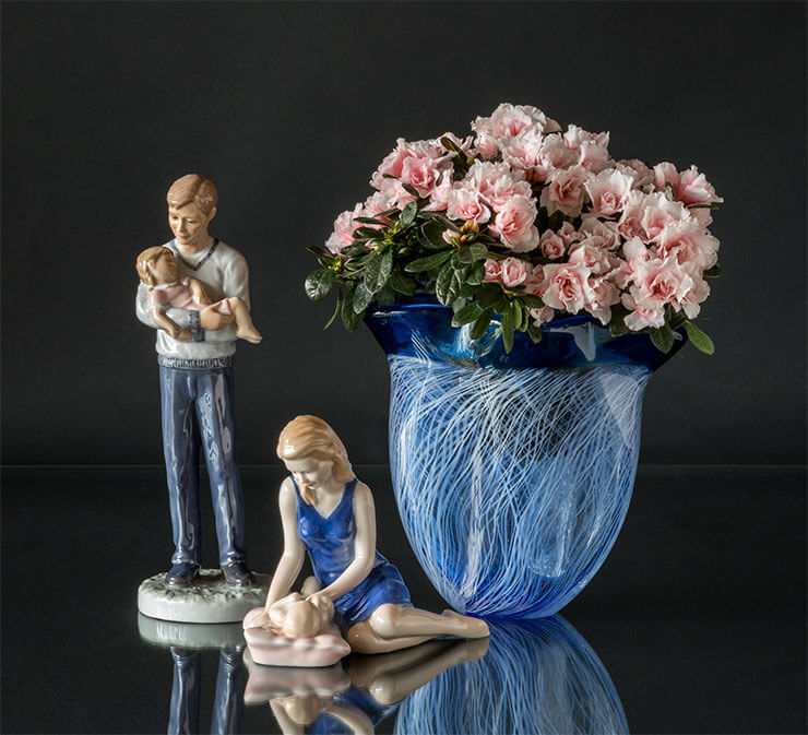 Royal Copenhagen Eltern mit Kinder und blaue Glaskunst Vase