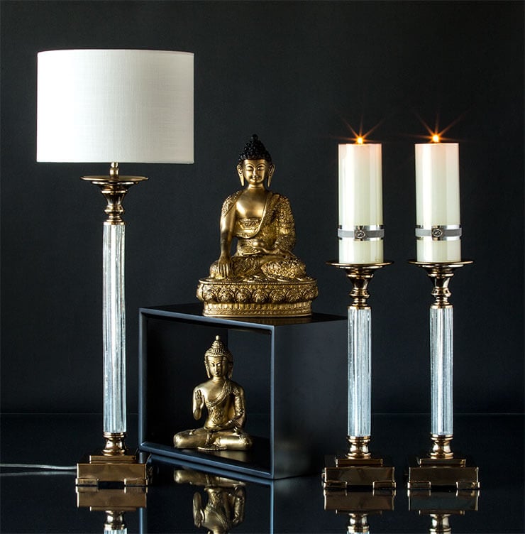 Buddha figurines and classical candleholders and Table lamp